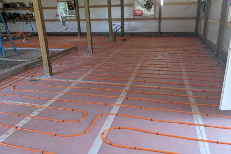 Heated concrete floor installation